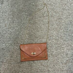 Brown envelope bag. Never used. Bought on venus